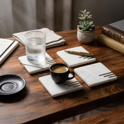 Premium marble drink coasters with brass stripe design on wooden table