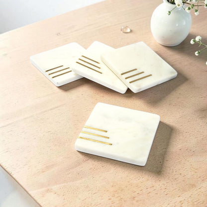 White marble coaster set with brass inlay handcrafted luxury table accessory