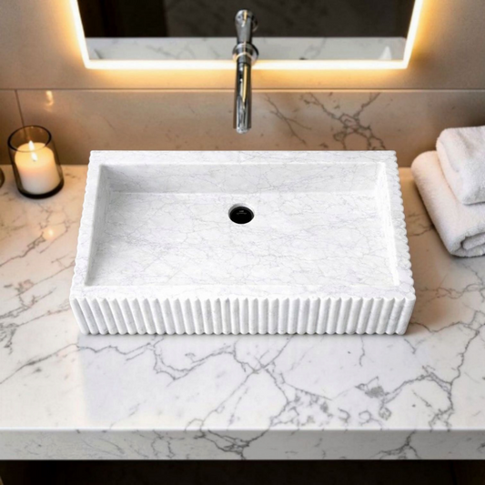 Modern marble sink with ribbed exterior design